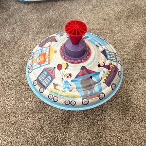 Circus-Themed Spinning Top Toy with Red Handle